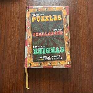 Puzzles Challenges Enigmas coffee table‎ book